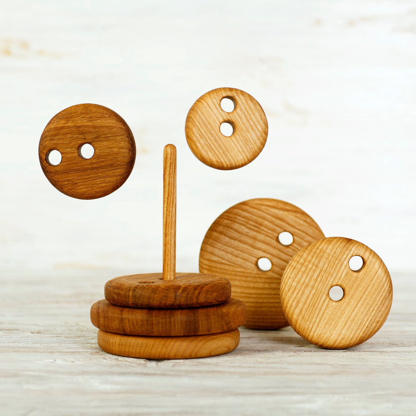 Stacking toy with 2 centers