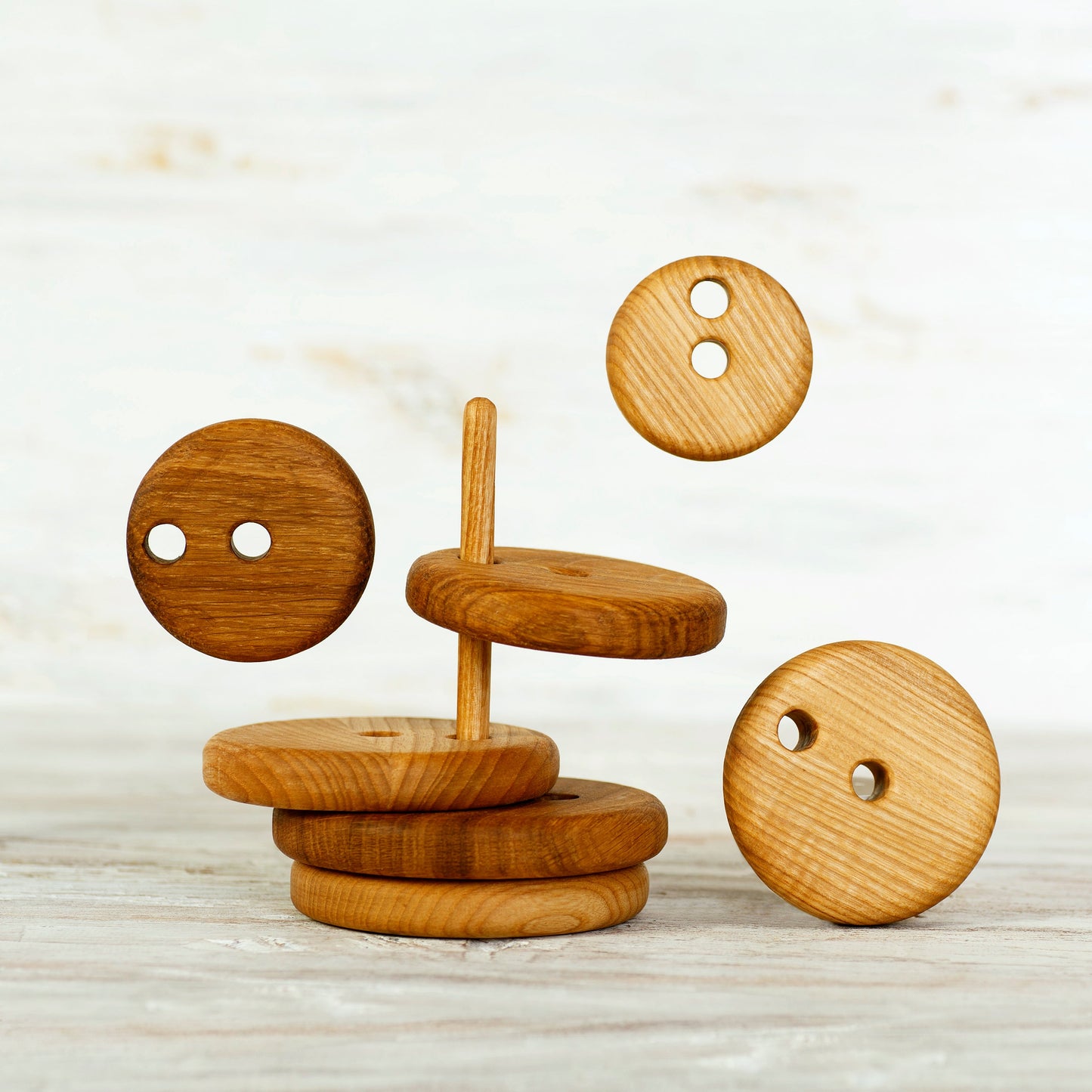 Stacking toy with 2 centers